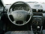  20  Opel Astra  4-. (G 1998 2009)